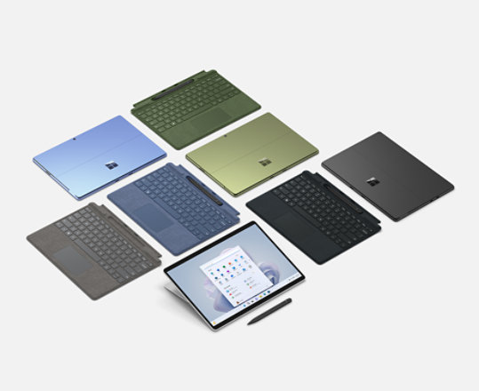 Surface Pro Signature Keyboard with Slim Pen 2 devices in a variety of colors.