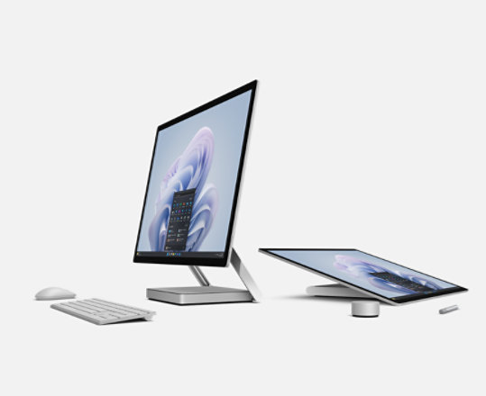 Surface Studio 2+ for Business in both upright and folded positions, next to a variety of Surface accessories.