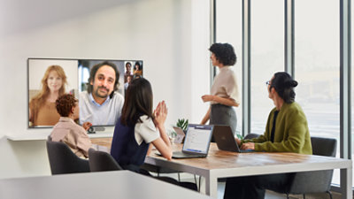 A team of business professionals meeting in a modern office.