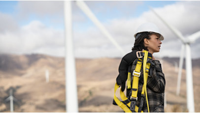 Woman working on a wind farm