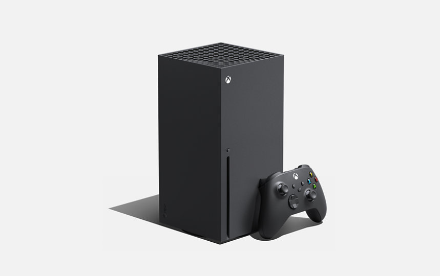An Xbox Series X with a wireless controller.