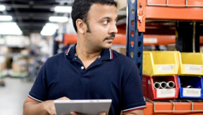 A person working in a warehouse.