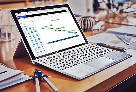 A laptop displaying a professional diagram in Visio