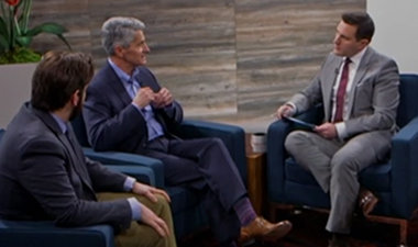 Still image from video showing Alex Bradley, Curt Dukes, and Evan Anderson sitting across from each other having a conversation.