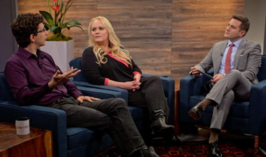 Still image from video showing Alex Bradley, Jennifer Arcuri, and Jeff Moss sitting across from each other having a conversation