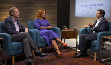 Still image from video showing Alex Bradley, Elena Elkina, and Brad Smith sitting across from each other having a conversation.