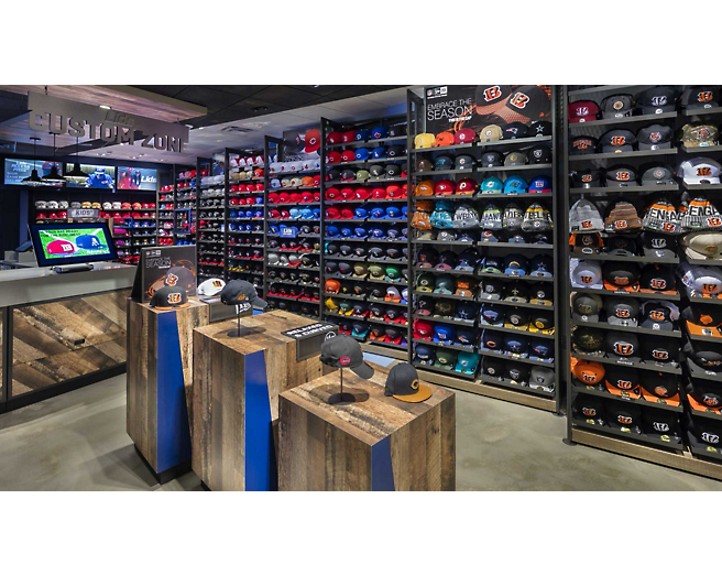 A baseball store with many hats on display.