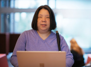 A person with visual impairment using a laptop.