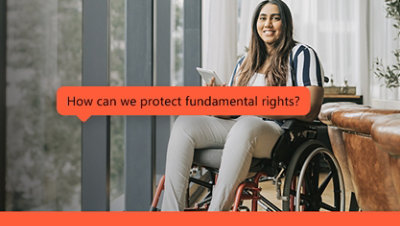 A woman sitting in a wheelchair, holding a tablet, with the text "How can we protect fundamental rights?" displayed.