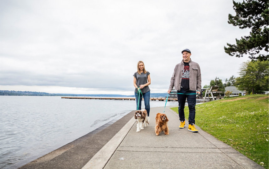 Craig Cincotta and his wife, Melissa Cincotta, walk their dogs along the waterfront