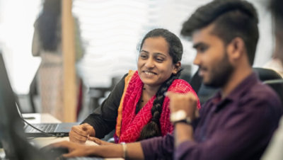 A person looking at a computer screen