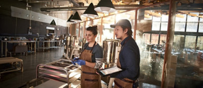 A group of people in aprons.