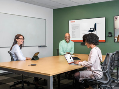 A group of people sitting around a table