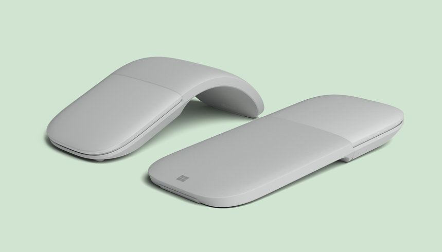 A Surface Arc Mouse for Business in the curved position and a Surface Arc Mouse for Business in the flat position. 