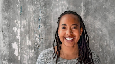 A person smiling at the camera