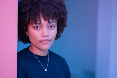 A woman wearing black dress.