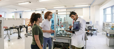 A group of people standing in a room