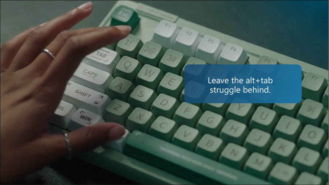 A closeup of a keyboard and a hand pressing Alt+ Tab with text that reads “Leave the alt+ tab struggle behind”