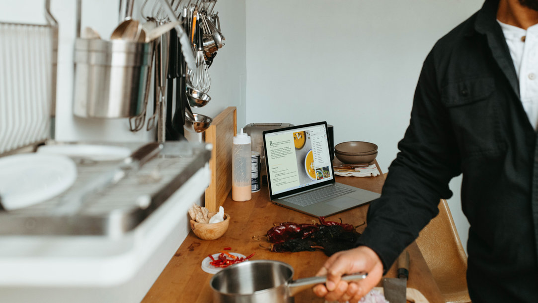 A man preparing food in a kitchen