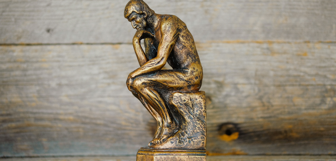 A statue of a thinking person