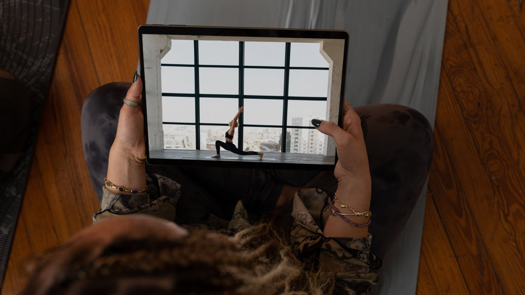 A woman media casting on a Microsoft Surface device