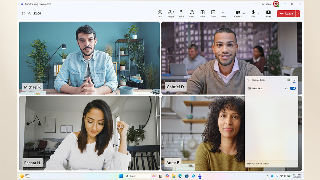 A woman using a Copilot+ PC on a video call in a home office setting