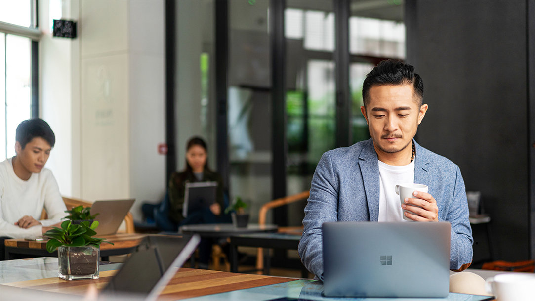 A young professional implementing HTTPS security on his computer