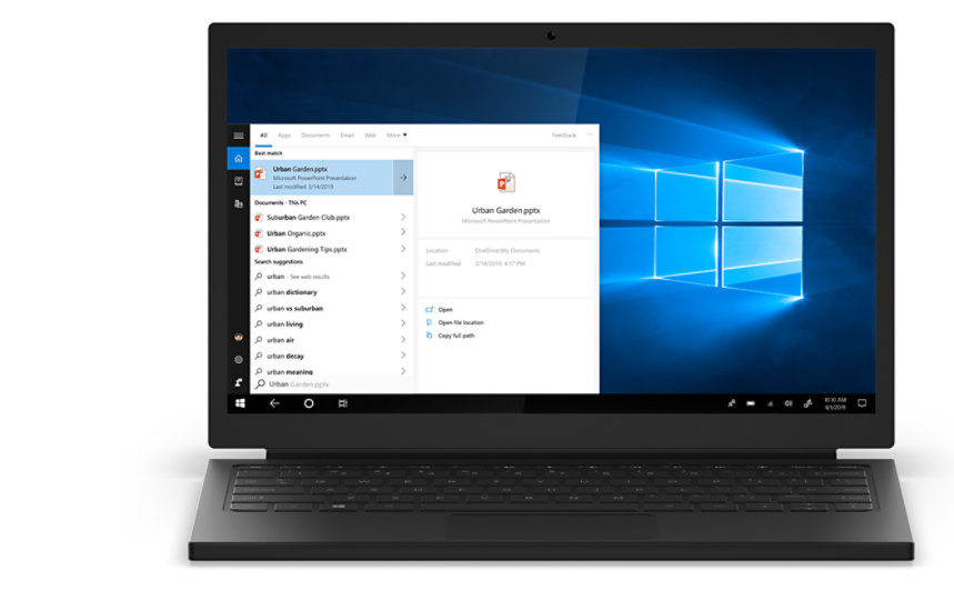 Schwarzer Laptop mit Windows 10 Homescreen und geöffneter Start-Taskleiste.