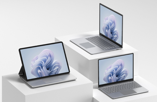 Four Surface devices are observed on plinths of various heights