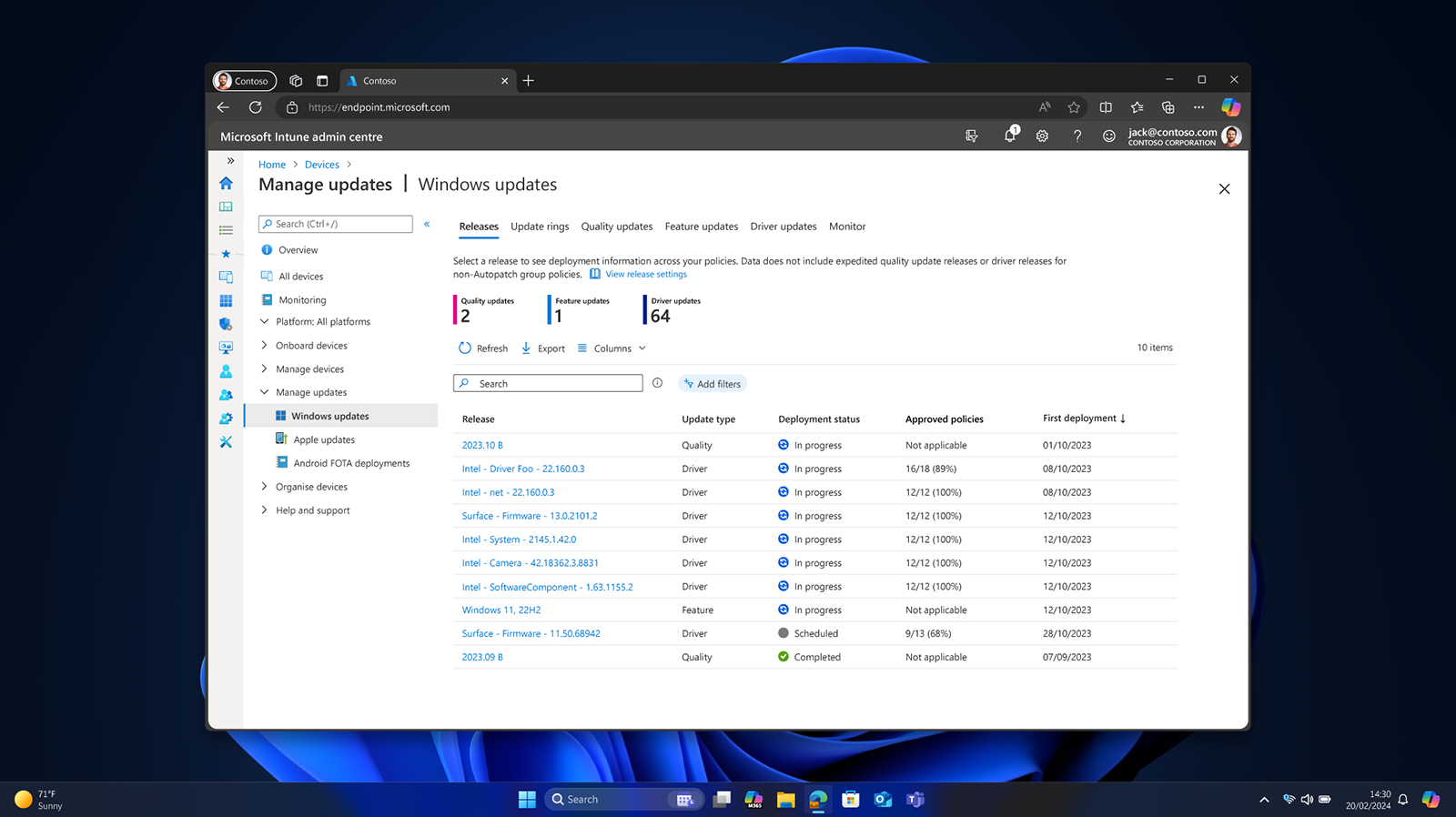 A Windows Pro device screen displaying a blue bloom image under a list of manageable IT policies