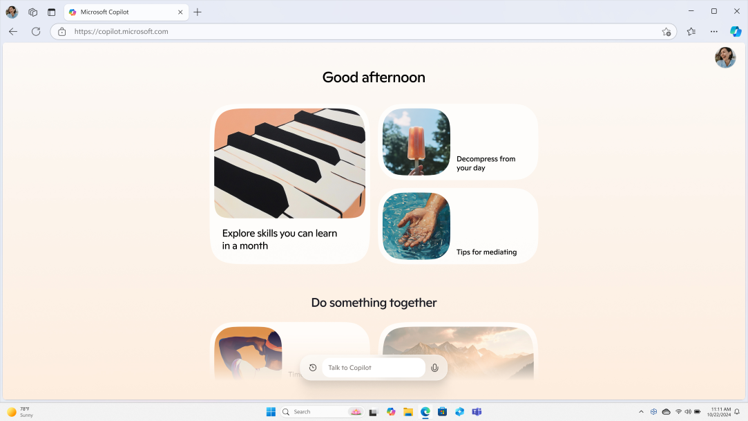 Talk to Copilot chat window with piano keys, and popsicle, and a hand in water