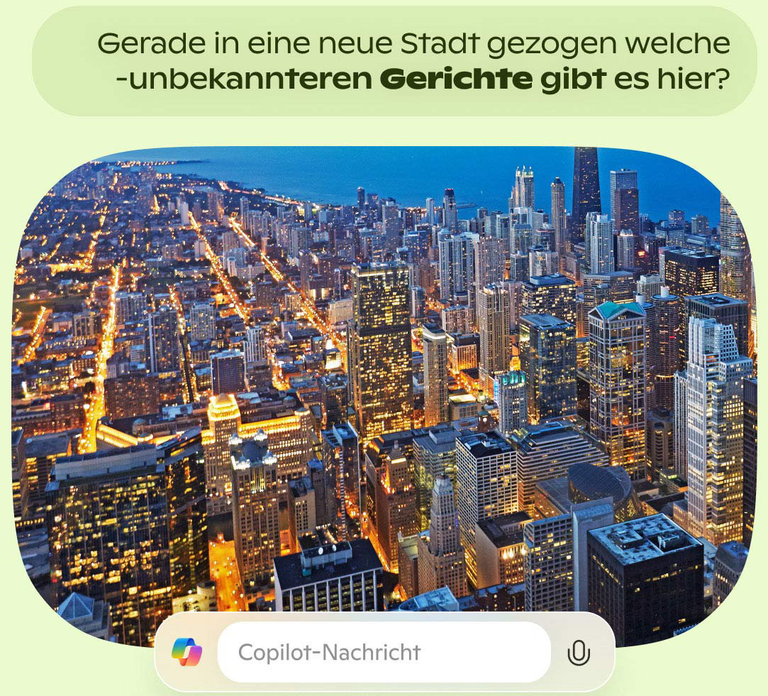 Luftaufnahme der Skyline einer Stadt und eines nachts beleuchteten Straßenrasters.