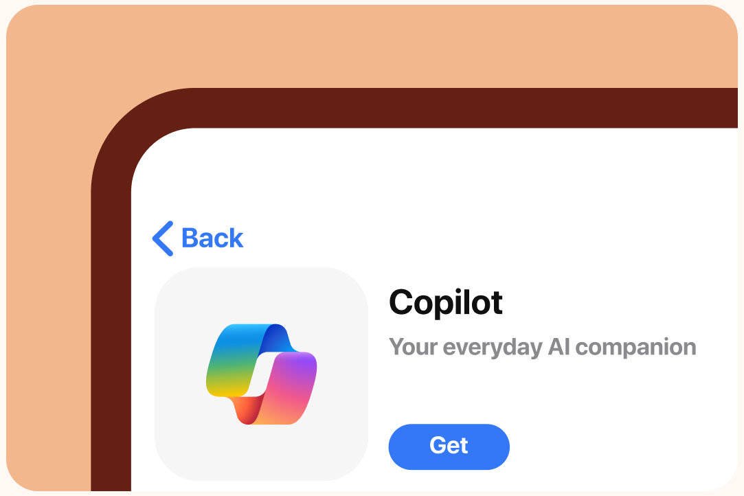 Copilot app on a mobile phone on a light orange background.