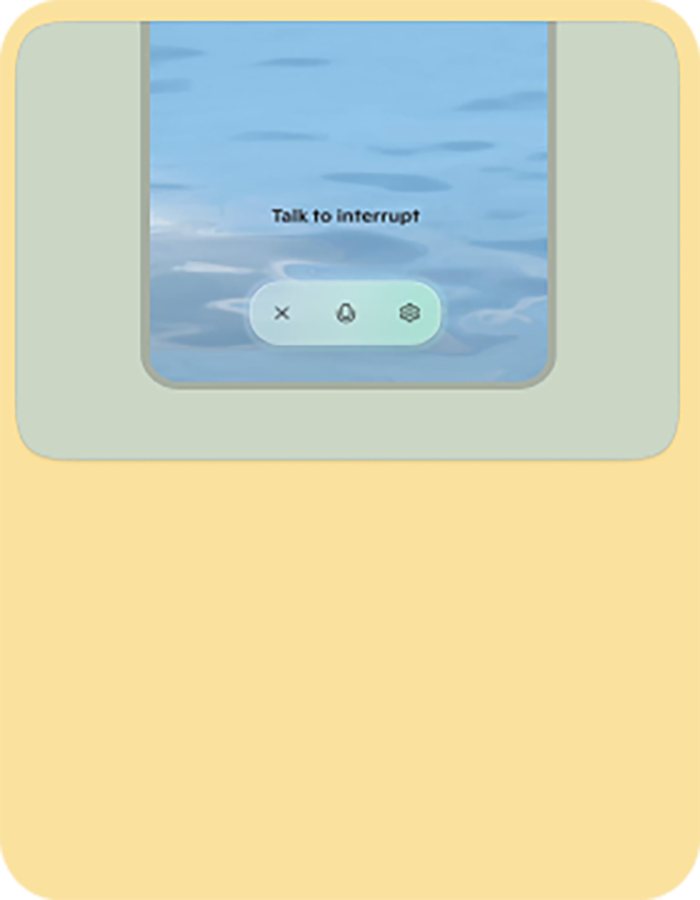 Copilot voice control screen with a water background, showing ‘Talk to interrupt’ and icons for cancel, microphone, and settings