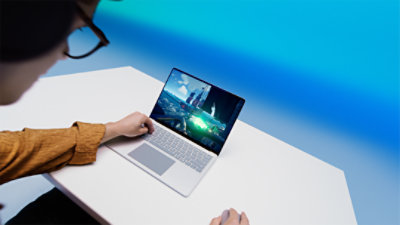 Dylan shows how easy it is to game and multitask on a Copilot+ PC