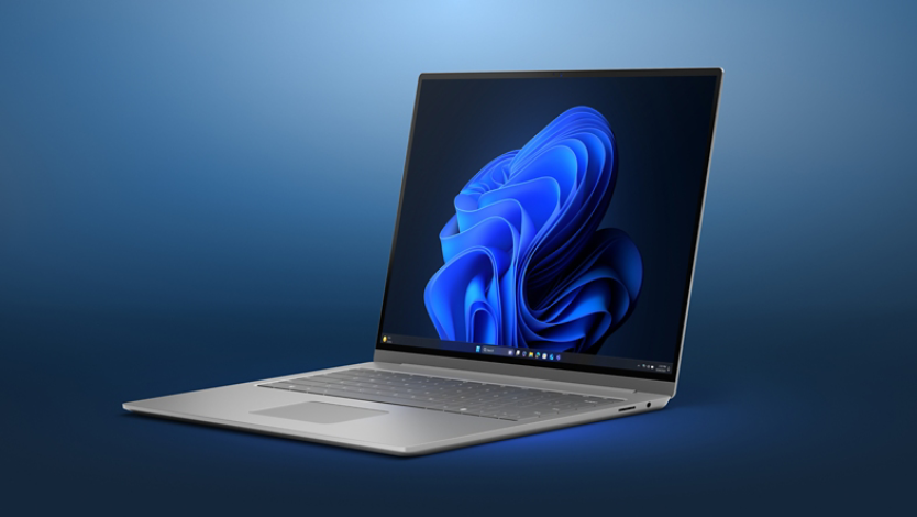 A laptop device with the Microsoft blue bloom on home screen