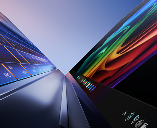 Close-up view of Surface Laptop with illuminated keyboard on the left and a rainbow bloom background screen on the right.