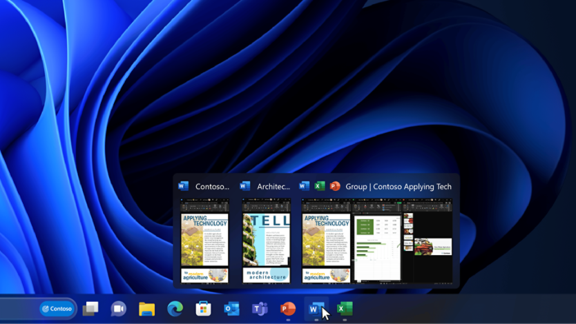 Dataskjerm som viser Windows 11-skrivebordet med en oppgavelinje. 