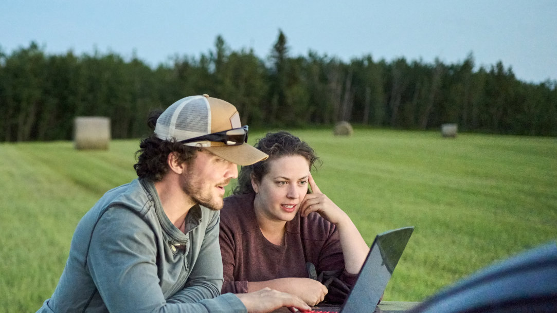 Farmers using a Windows laptop and experiencing slow loading apps due to an insufficient amount of RAM