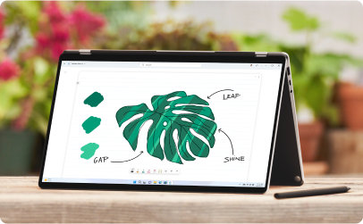 Отворен лаптоп с илюстрирано листо на екрана