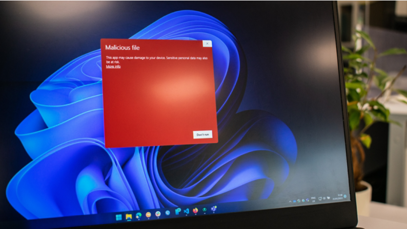 Malicious file warning on a computer
