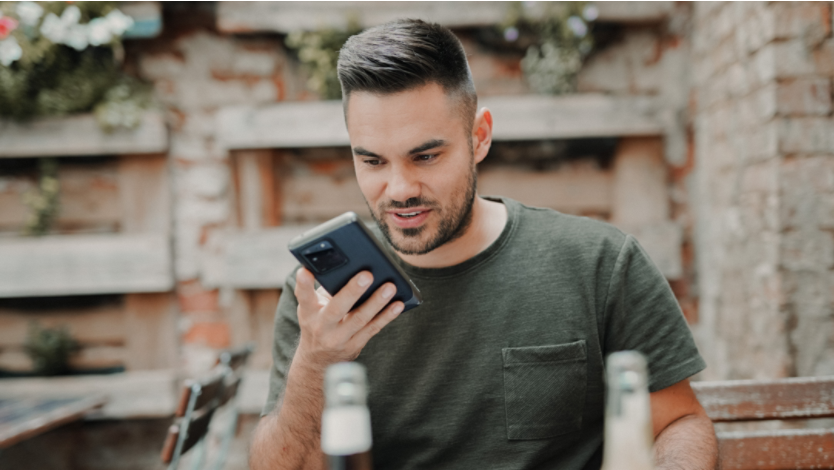 Man using text-to-speech on his phone