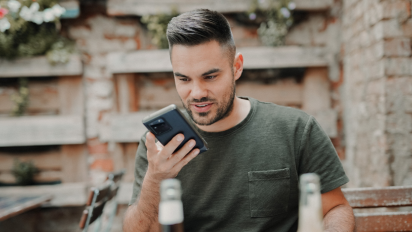 Man using text-to-speech on his phone