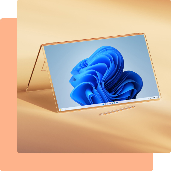 Aufgeklappter PC mit Windows 11-Blüte