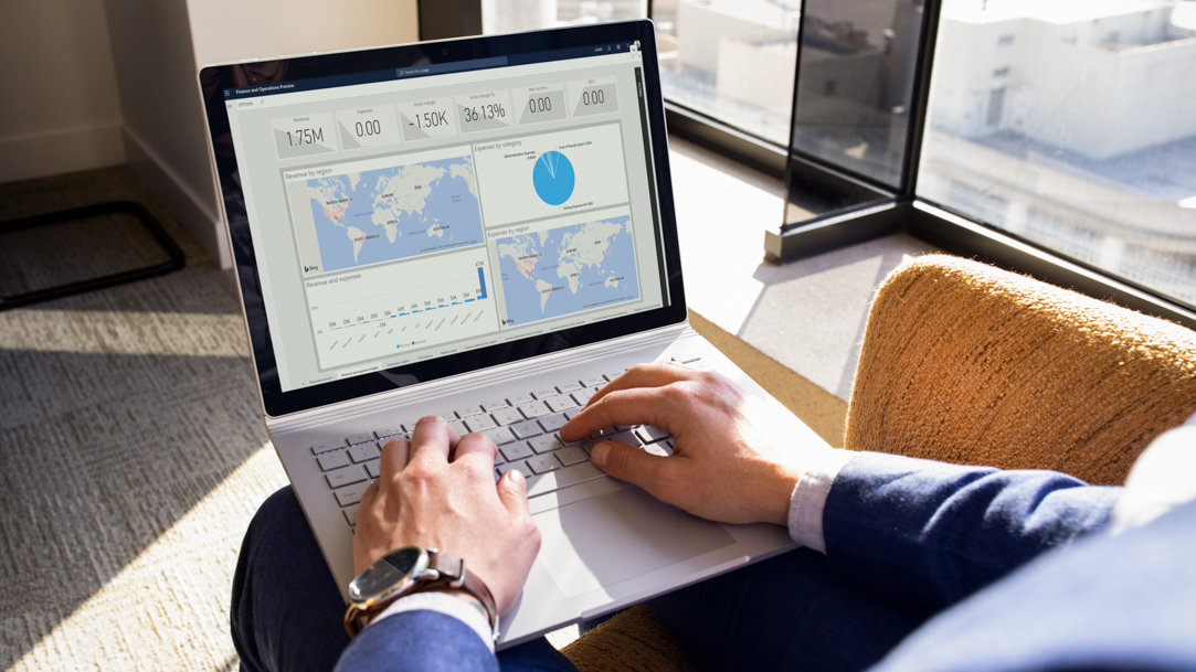 Person typing on a Surface laptop keyboard