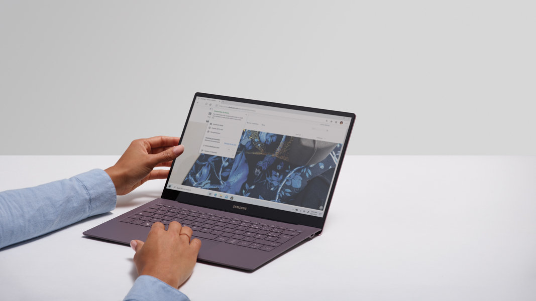 Woman using Microsoft Edge on Surface laptop