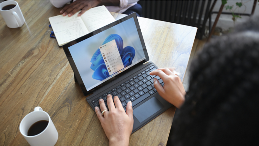 Person using Windows 11 on a Surface laptop