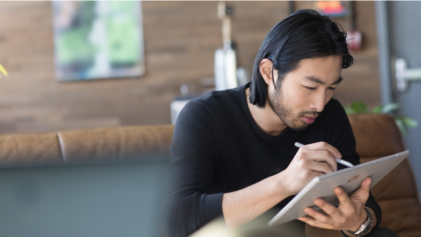 Person using a Surface Pen on their Surface device