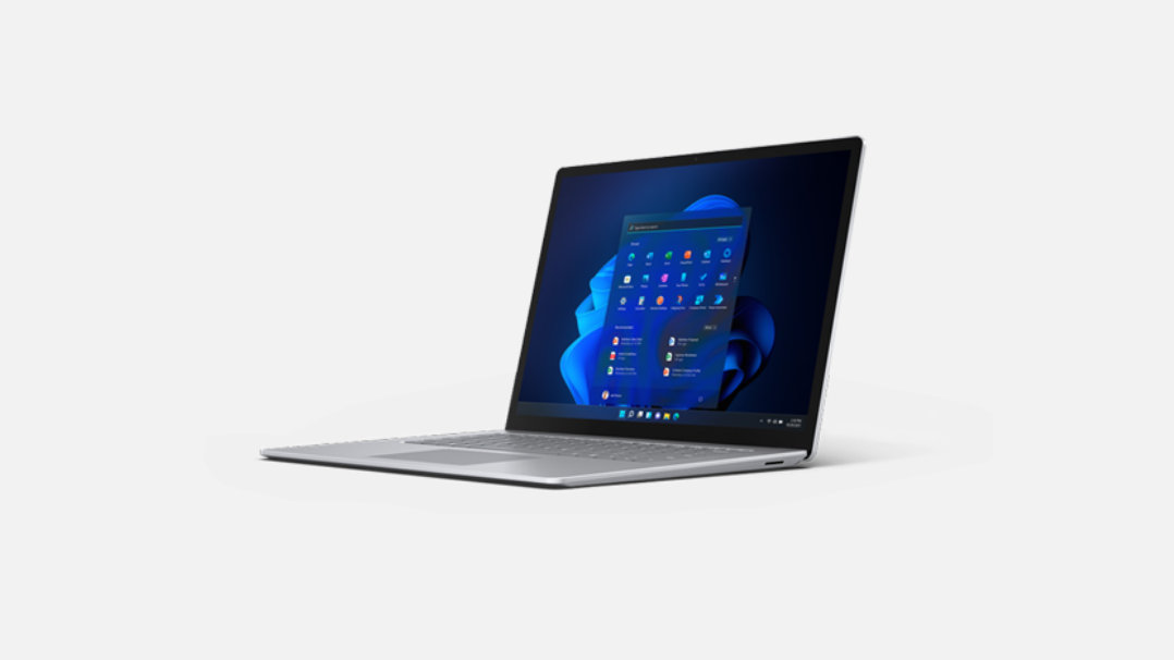 Wygenerowany cyfrowo obraz urządzenia Surface Laptop 4 z wyświetlonym interfejsem systemu Windows 11