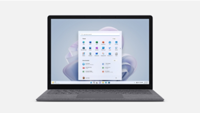 Surface Laptop 5 shown from the front in platinum with a matching platinum blossom on the Windows 11 start screen.